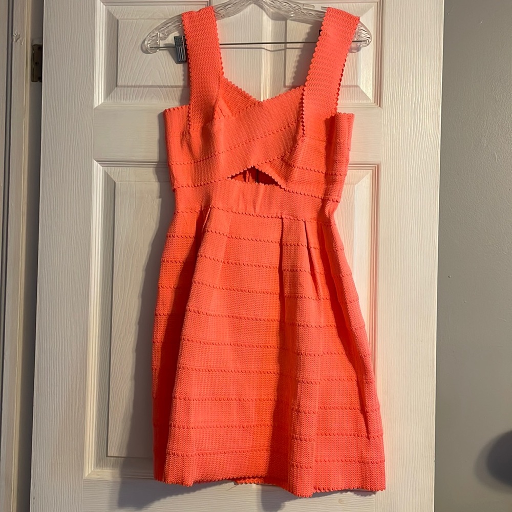 Coral bandage dress with front cut out